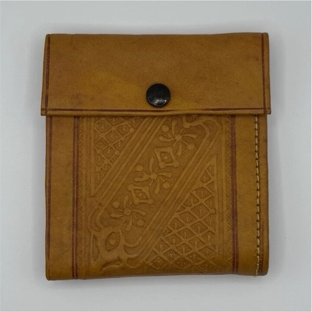 Handcrafted Moroccan leather wallet featuring snap closure
